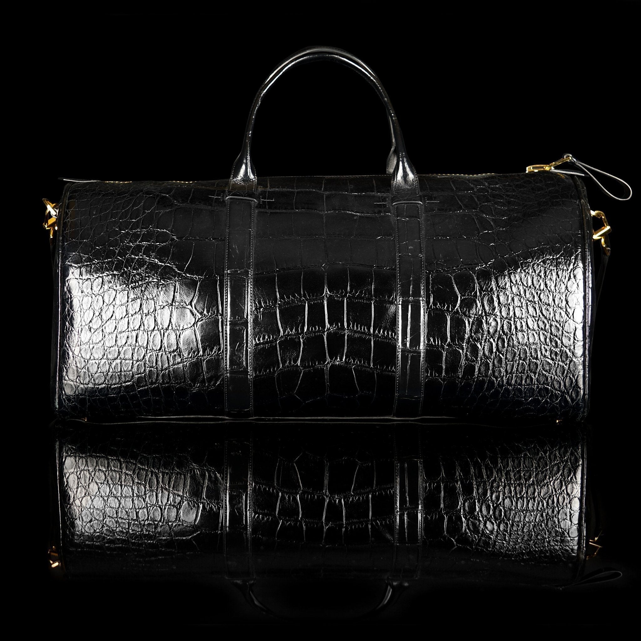 Tom Ford-Duffle-BK LARGE ALLIGATOR-Upper: Alligator Hardware: Brass Measures: 60 x 29 x 30 cm Lightweight Version of the Iconic Style New Detachable Shoulder Strap Buckles Inner Zip Pocket Made in Italy Crafted of Luxurious Alligator Tom Ford brings you L