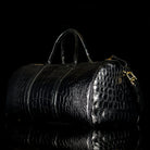 Tom Ford-Duffle-BK LARGE ALLIGATOR-Upper: Alligator Hardware: Brass Measures: 60 x 29 x 30 cm Lightweight Version of the Iconic Style New Detachable Shoulder Strap Buckles Inner Zip Pocket Made in Italy Crafted of Luxurious Alligator Tom Ford brings you L