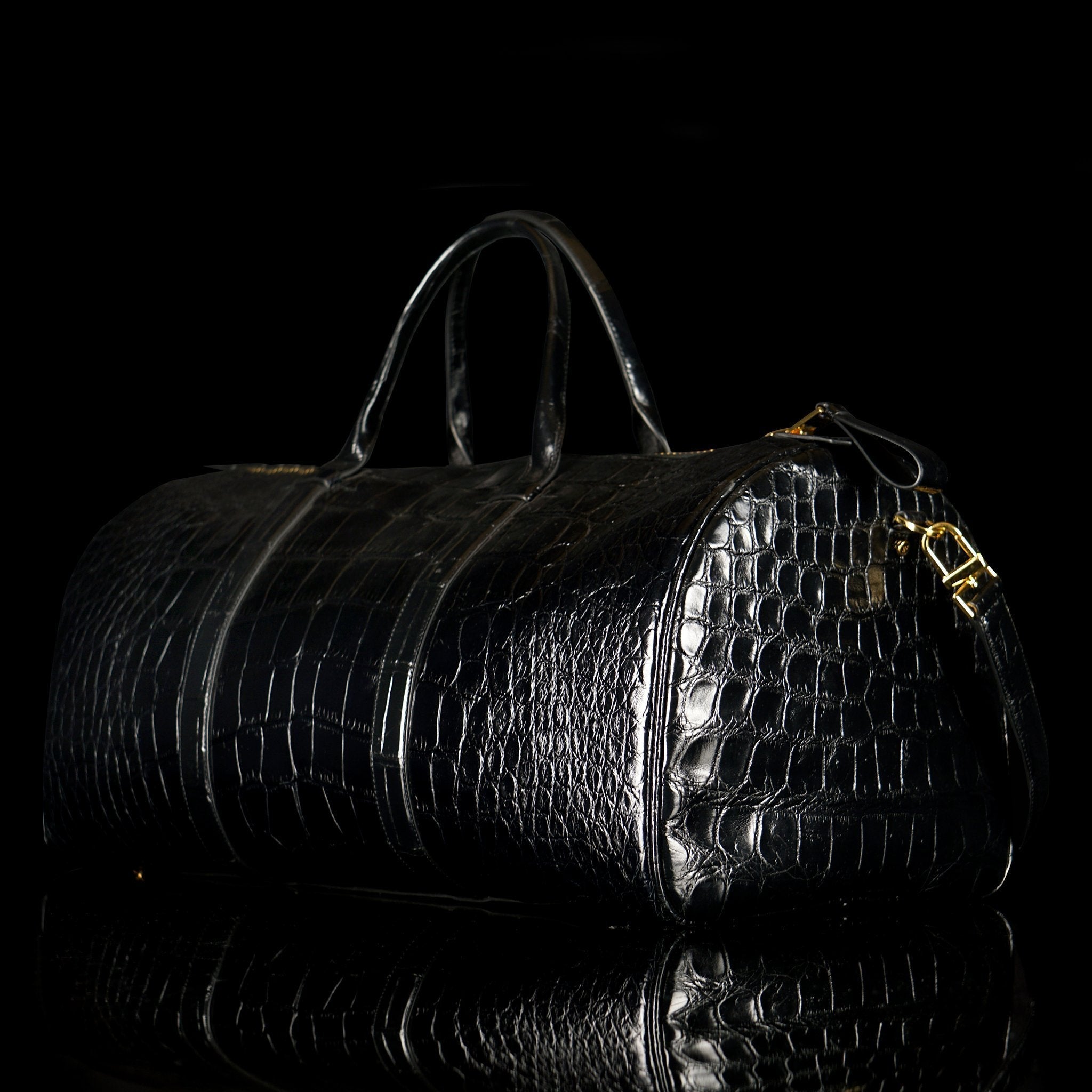 Tom Ford-Duffle-BK LARGE ALLIGATOR-Upper: Alligator Hardware: Brass Measures: 60 x 29 x 30 cm Lightweight Version of the Iconic Style New Detachable Shoulder Strap Buckles Inner Zip Pocket Made in Italy Crafted of Luxurious Alligator Tom Ford brings you L