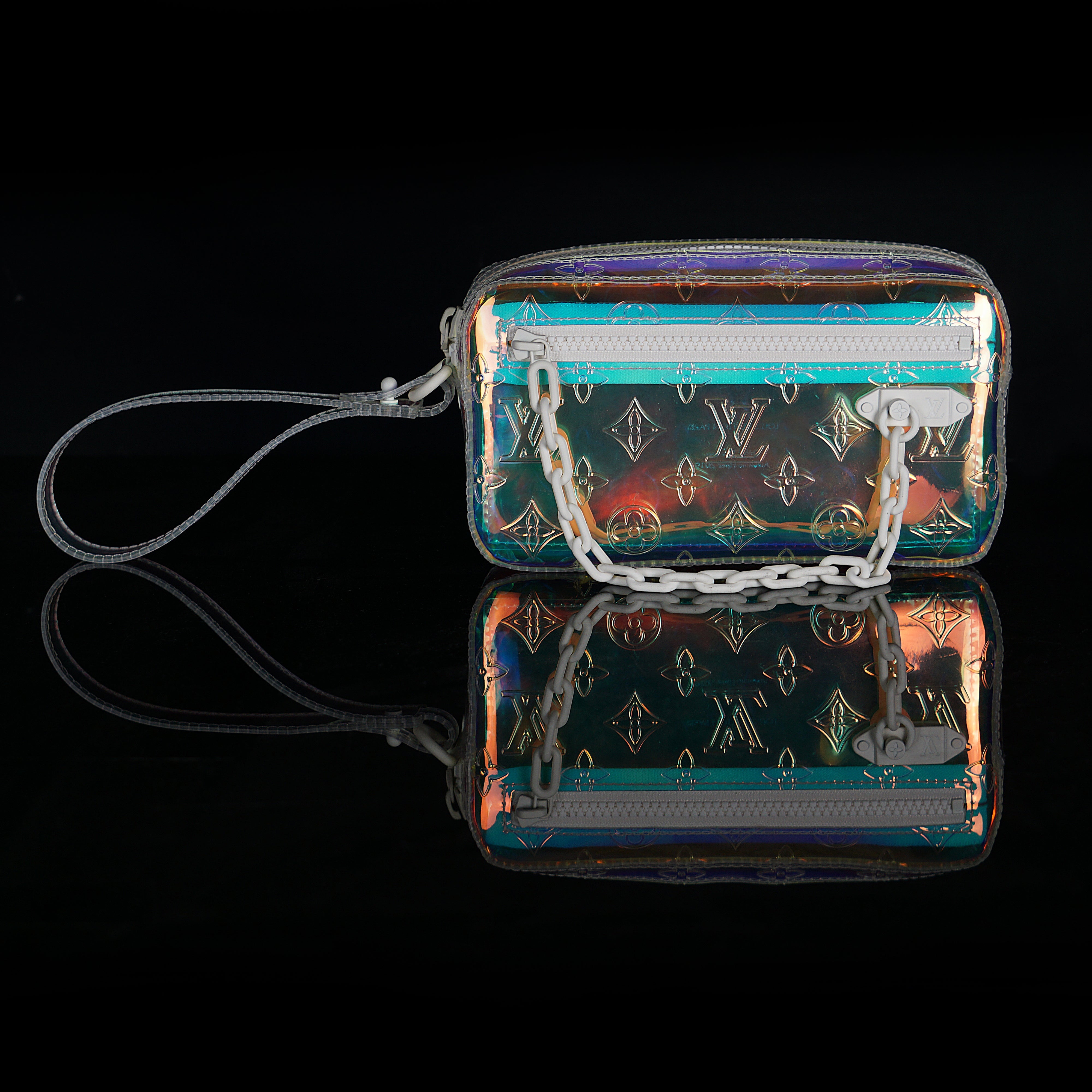 Louis Vuitton-Clutch-23.0 x 11.5 x 4.0 cm (Length x height x width ) L 8.4 x H 4.7 x W 1.9 inches Highly resistant PVC Highly resistant PVC and calf-leather trim Mat-white hardware Zipped compartment Zipped front pocket Removable strap-fabriqe.com