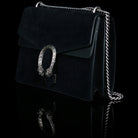 Gucci-Dionysus Shoulder Bag-Black Suede , a material with low environmental impact. Antique silver-toned hardware Tiger head closure Interior zippered compartment Pocket under the flap External rear pocket Sliding chain strap can be worn as a shoulder strap with 35 drop or can be worn as a top handle with 22 drop Medium size: W30cm x H21cm x D10cm Leather lining with interior pockets Made in Italy The model is 178 cm-fabriqe.com