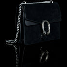 Gucci-Dionysus Shoulder Bag-Black Suede , a material with low environmental impact. Antique silver-toned hardware Tiger head closure Interior zippered compartment Pocket under the flap External rear pocket Sliding chain strap can be worn as a shoulder strap with 35 drop or can be worn as a top handle with 22 drop Medium size: W30cm x H21cm x D10cm Leather lining with interior pockets Made in Italy The model is 178 cm-fabriqe.com