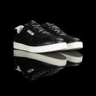 Chanel-Weekend sneakers-Colour: Black, White Mid Sole, White outer sole Limited Edition Calfskin Leather Chanel text on laces White Pull tab Black CC Logo on pull tab-fabriqe.com