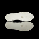 Chanel-Weekend sneakers-Colour: Black, White Mid Sole, White outer sole Limited Edition Calfskin Leather Chanel text on laces White Pull tab Black CC Logo on pull tab-fabriqe.com