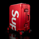 Rimowa-Suitcase-Colour: Red Exclusive-Limited Stock Aluminium/Aluminum, Plastic Handle Supreme X Rimowa Topas brings you the multiwheel suitcase. Designed exclusively for Supreme in aluminium bodies by Rimowa. This suitcase feature TSA combination locks a