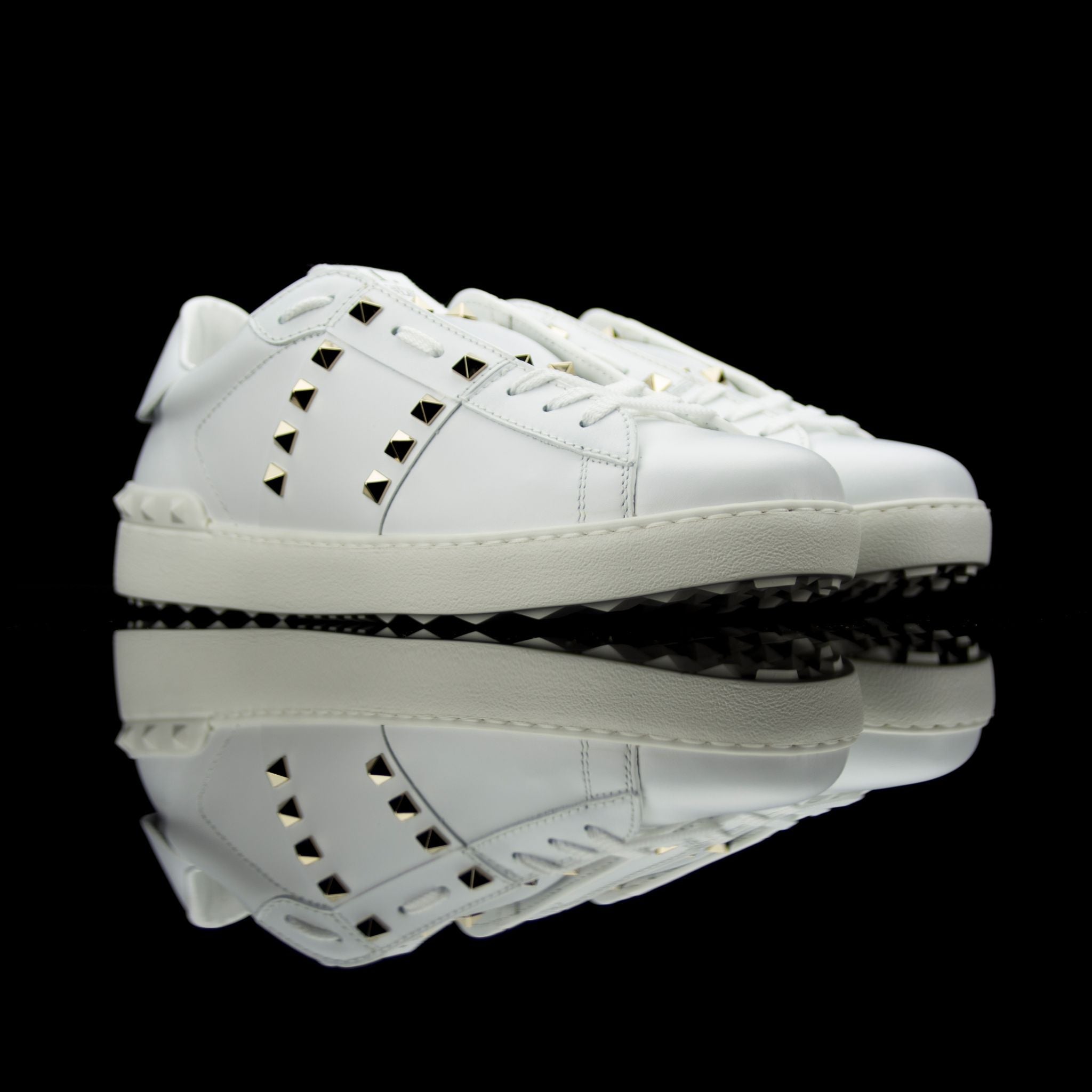 Valentino-Rockstud Sneakers-White leather Silver Rockstuds, leather linings, rubber soles Lace-up Come with dust bags Made in Italy Rockstud Untitled low by Valentino is a piece of intricate design. A luxury statement crafted in white leather and studded
