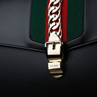 Gucci-Sylvie Bag-Black leather Gucci Flag Gold toned hardware Interior zip and smartphone pockets Handle with 12cm drop Detachable shoulder strap with 41cm drop Nylon Web detail with metal chain and buckle closure Made in Italy-fabriqe.com