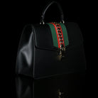 Gucci-Sylvie Bag-Black leather Gucci Flag Gold toned hardware Interior zip and smartphone pockets Handle with 12cm drop Detachable shoulder strap with 41cm drop Nylon Web detail with metal chain and buckle closure Made in Italy-fabriqe.com