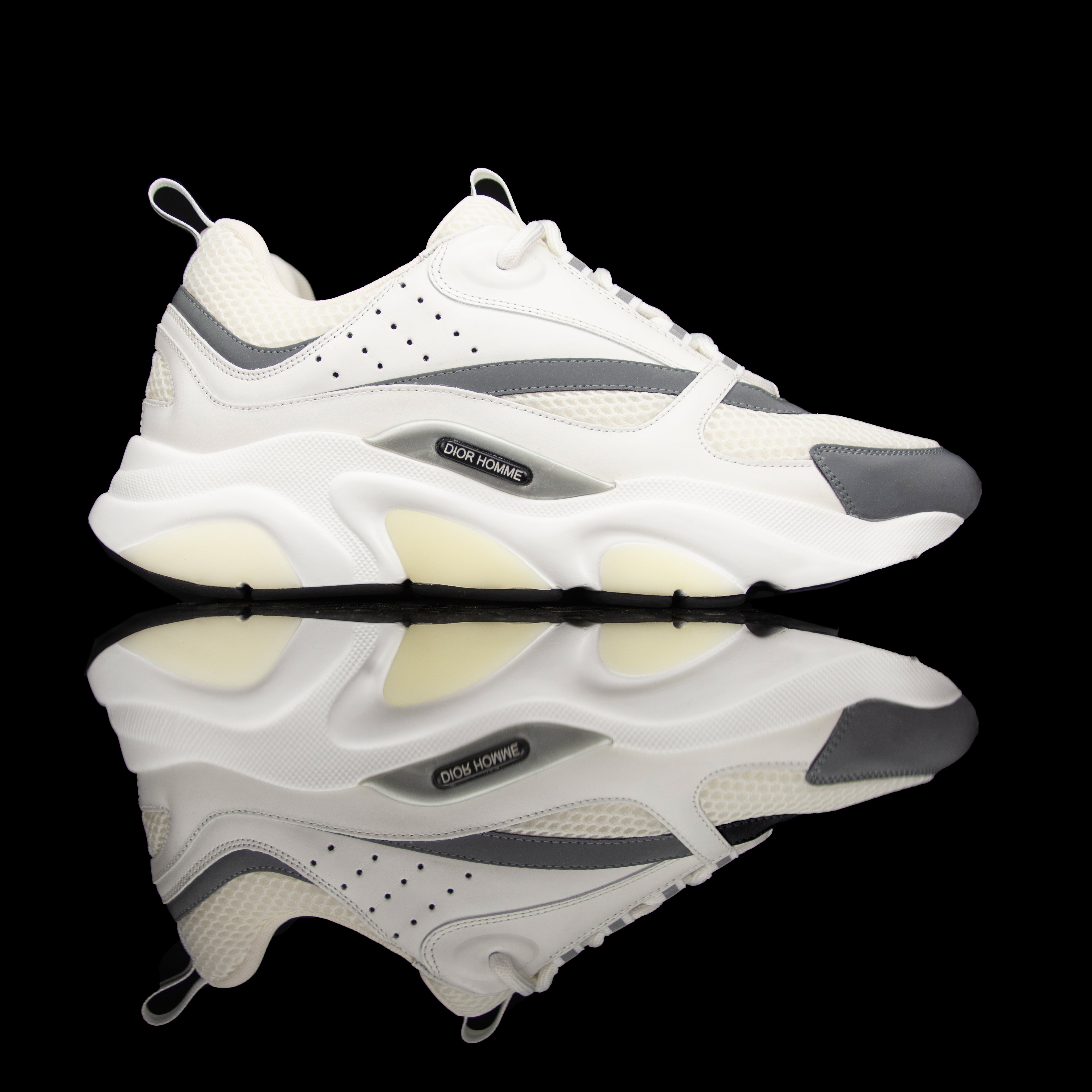 Dior Homme-B22 Sneakers-White technical knit and white calfskin Reflective Material on toe White cotton laces White nylon lining Black nylon pull tab Black rubber sole, textured “Dior Homme” logo “Welded” construction-fabriqe.com