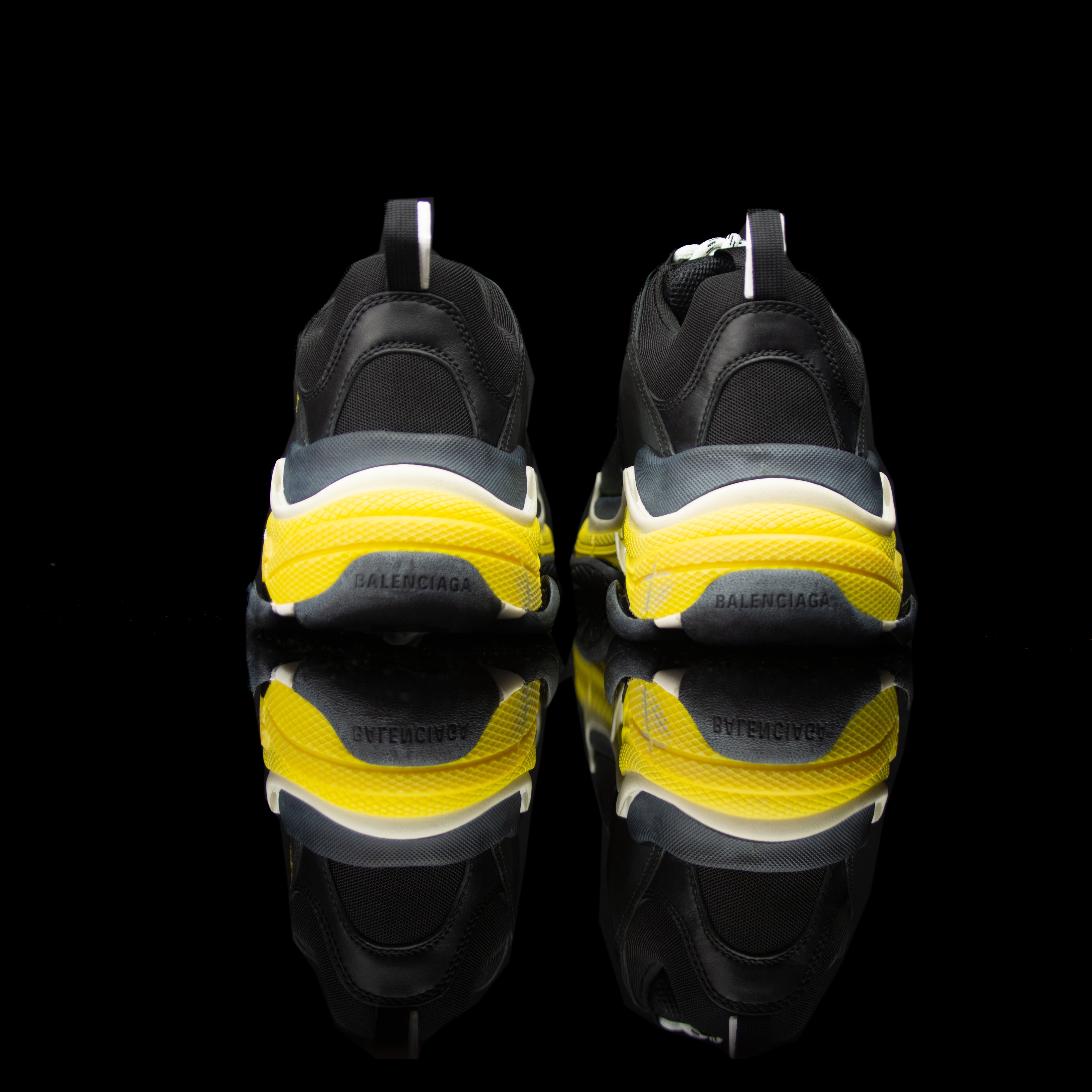 Balenciaga-Triple S-Pre Order Duration (3-5 Working Days) Product Code:534162 w09OG 1087 Colour: Black Yellow Limited Stock Material: Nubuck, Mesh, Rubber Sole Balenciaga Triple S Sneakers colour range is the new 2018 release for sneaker freaks. Crafted i