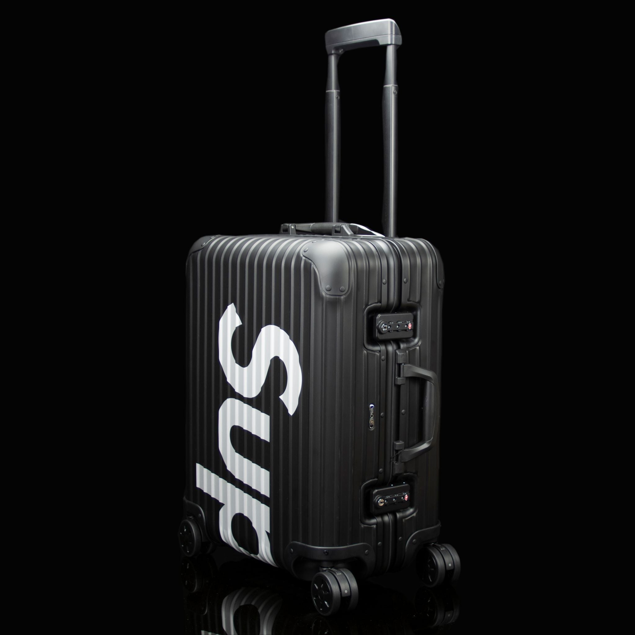 Rimowa-Suitcase-Colour: Black Exclusive-Limited Stock Aluminium/Aluminum, Plastic Handle Supreme X Rimowa Topas brings you the multiwheel suitcase. Designed exclusively for Supreme in aluminium bodies by Rimowa. Also, this suitcase feature TSA combination