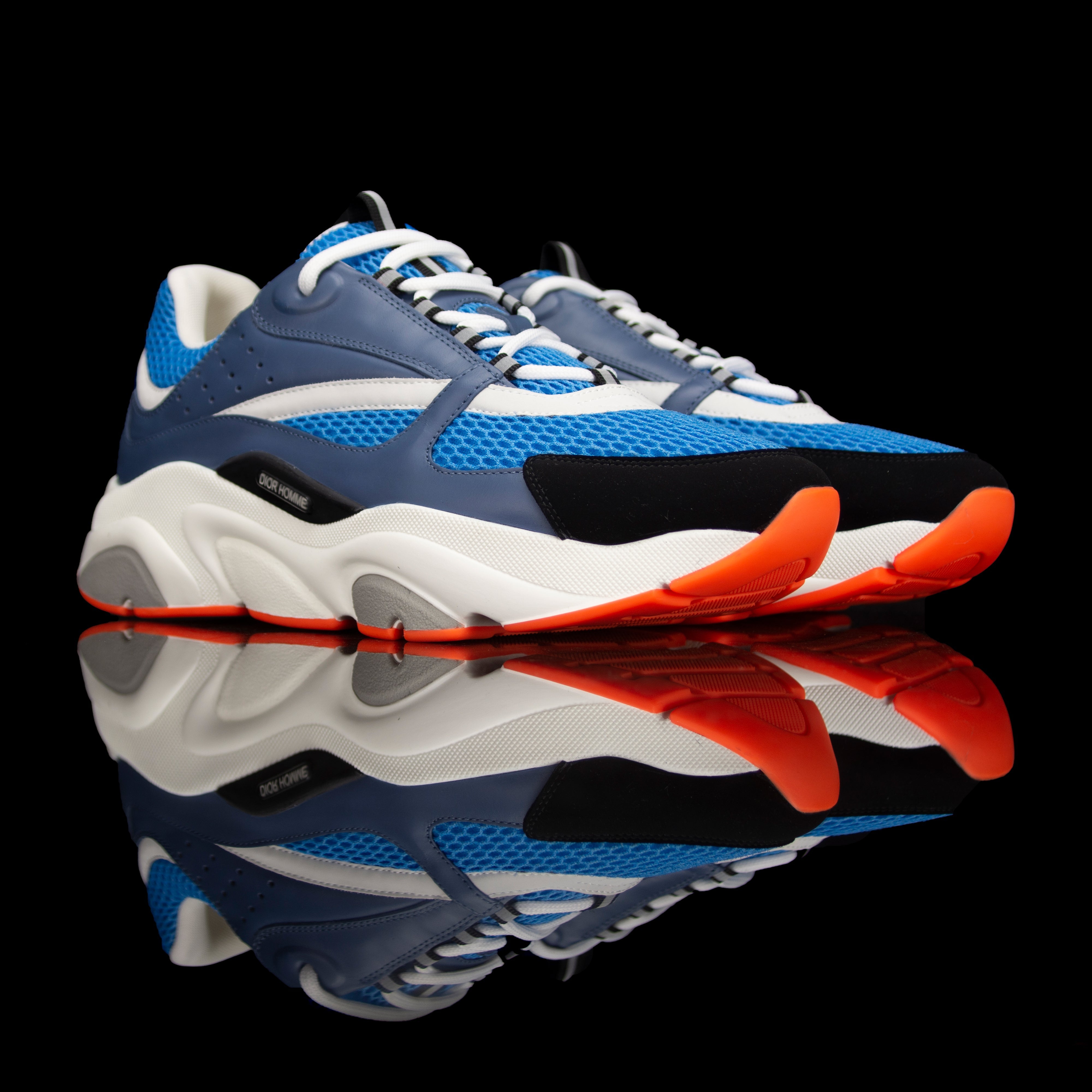 Dior Homme-B22 Sneakers-Pre-Order Duration: 3-5 working days Blue technical knit and black calfskin White cotton laces White nylon lining Black nylon pull tab Orange rubber sole, textured “Dior Homme” logo “Welded” construction-fabriqe.com