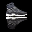 Chanel-CC Sneakers-Pre Order Duration (3-5 Working Days) CC Logo on side Black Black White Rubber Sole 2017 Release Limited Stock Chanel CCs crafted in mixed fabric sports CC branding on the side. Nylon at vamp, leather touch at white and suede line finish grabs the spotlight! In the 2017 limited release the sneakers carry Chanel typography on the rubber sole. Pre-order Exclusive!-fabriqe.com
