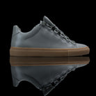 Balenciaga-Arena-Product Code: Colour: Khaki Carbon Fibre - Gum Sole Discontinued Material: Leather, Rubber Sole BALENCIAGA, the Paris based label drops the Arena Low. The casual sneakers are composed in Khaki Carbon Fibre Leather and Gum Sole. Also, the 
