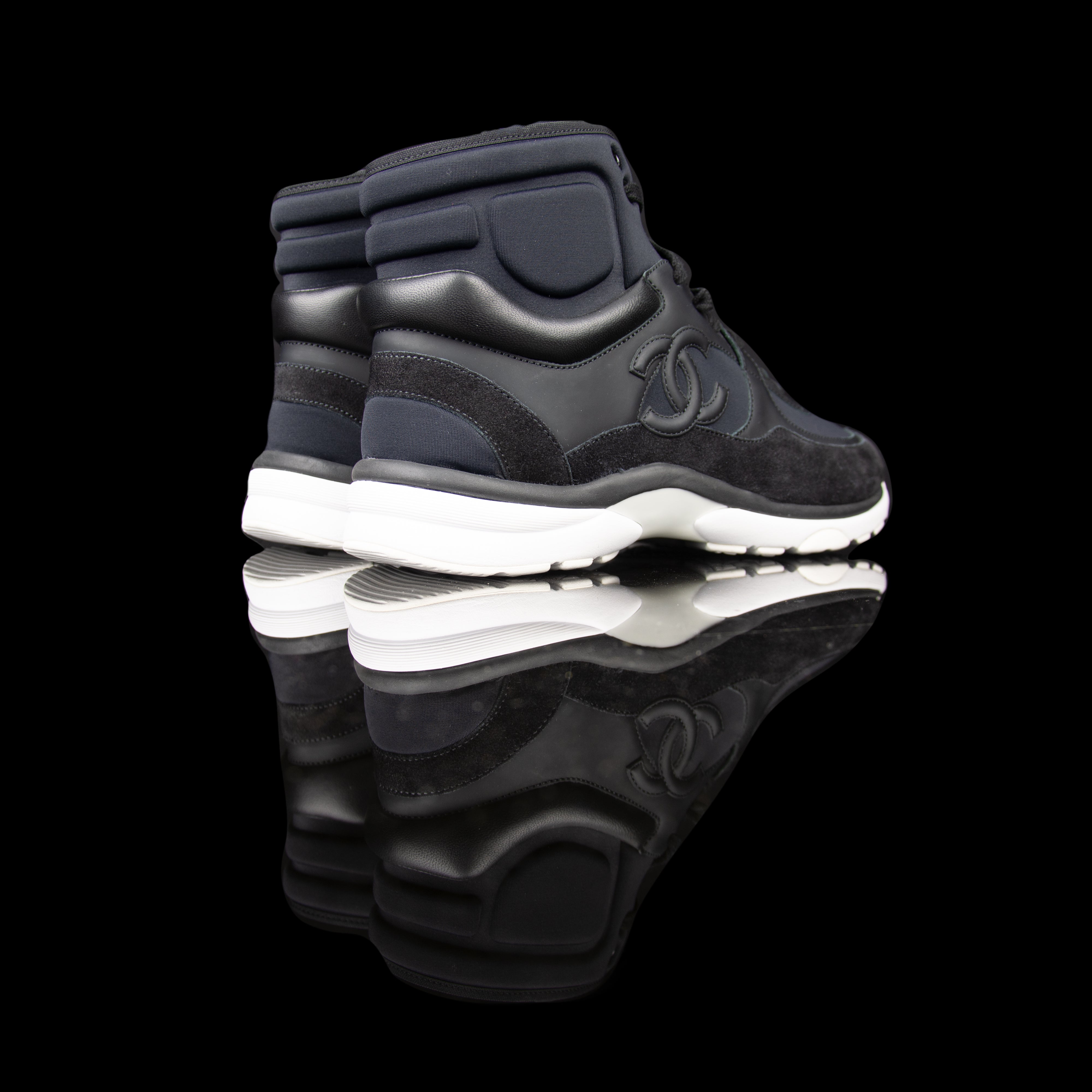 Chanel-CC Sneakers-Pre Order Duration (3-5 Working Days) CC Logo on side Black Black White Rubber Sole 2017 Release Limited Stock Chanel CCs crafted in mixed fabric sports CC branding on the side. Nylon at vamp, leather touch at white and suede line finish grabs the spotlight! In the 2017 limited release the sneakers carry Chanel typography on the rubber sole. Pre-order Exclusive!-fabriqe.com