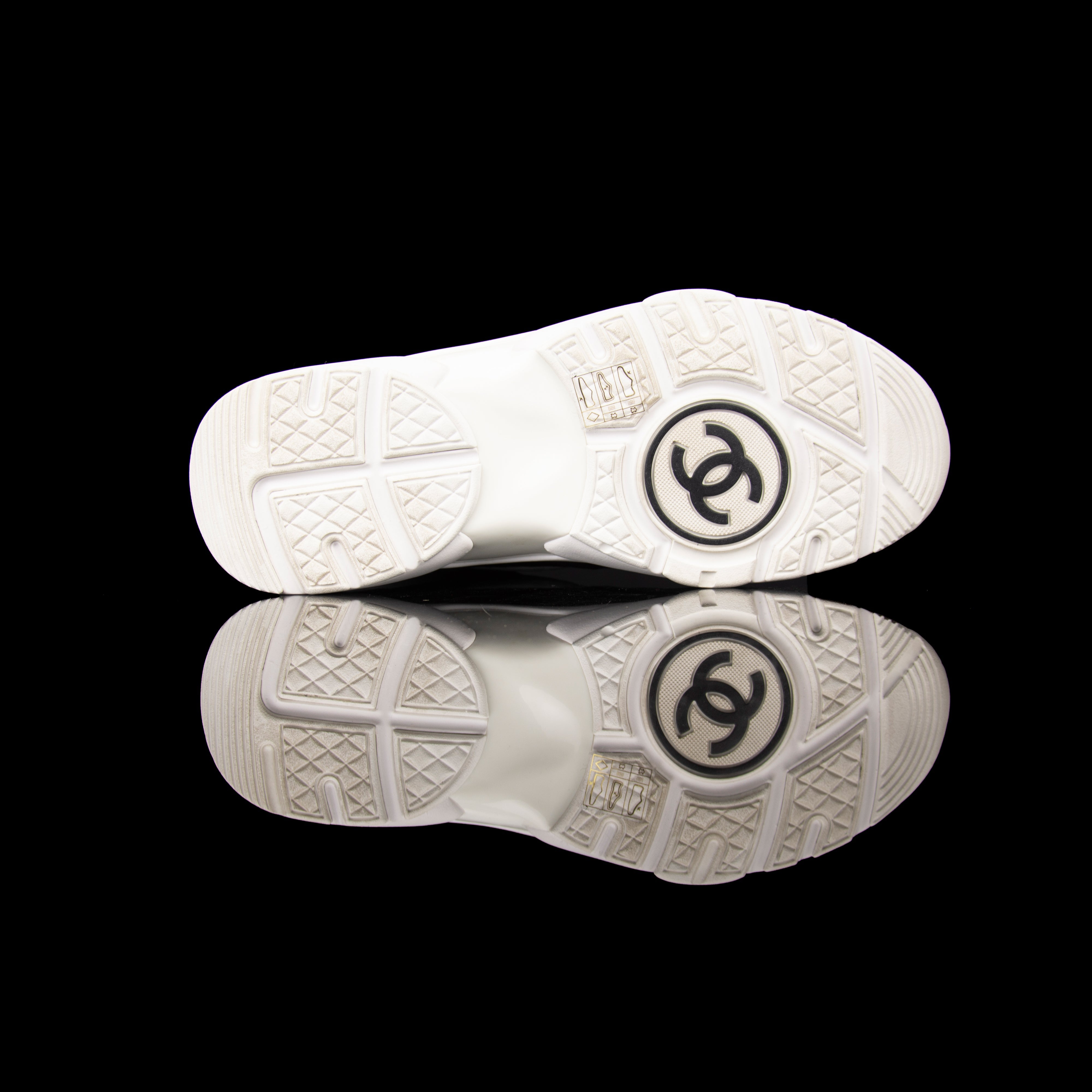 Chanel-CC Sneakers-Pre Order Duration (3-5 Working Days) CC Logo on side Black Black White Rubber Sole 2017 Release Limited Stock Chanel CCs crafted in mixed fabric sports CC branding on the side. Nylon at vamp, leather touch at white and suede line finish grabs the spotlight! In the 2017 limited release the sneakers carry Chanel typography on the rubber sole. Pre-order Exclusive!-fabriqe.com