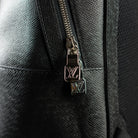 Louis Vuitton-Backpack-11.1 x 16.4 x 6.2 inches Taiga cowhide leather Cowhide leather trim Textile lining Silver-color metal hardware Top handle Zip closure Adjustable and non removable textile shoulder straps Front zipped compartment Mesh back 1 internal