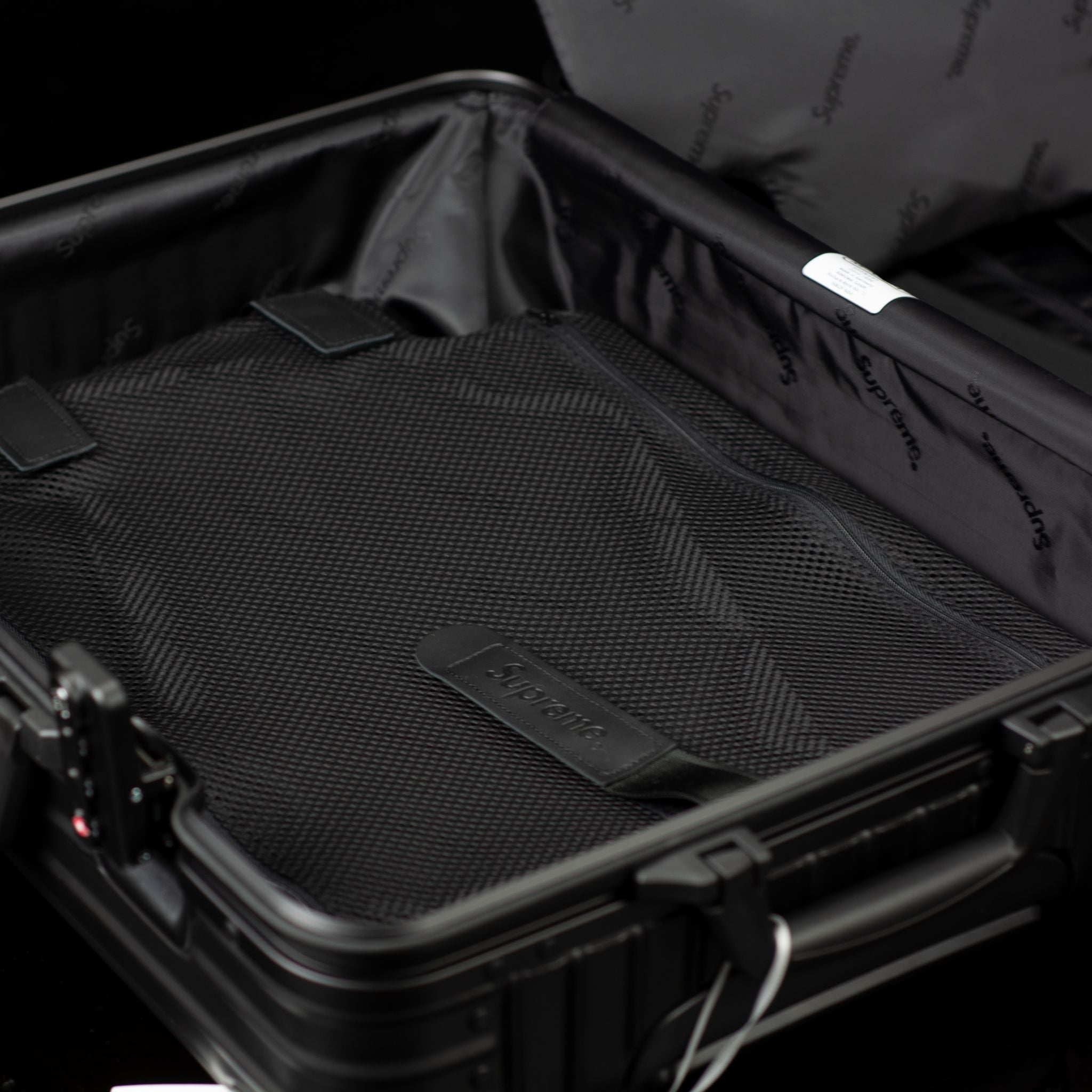 Rimowa-Suitcase-Colour: Black Exclusive-Limited Stock Aluminium/Aluminum, Plastic Handle Supreme X Rimowa Topas brings you the multiwheel suitcase. Designed exclusively for Supreme in aluminium bodies by Rimowa. Also, this suitcase feature TSA combination