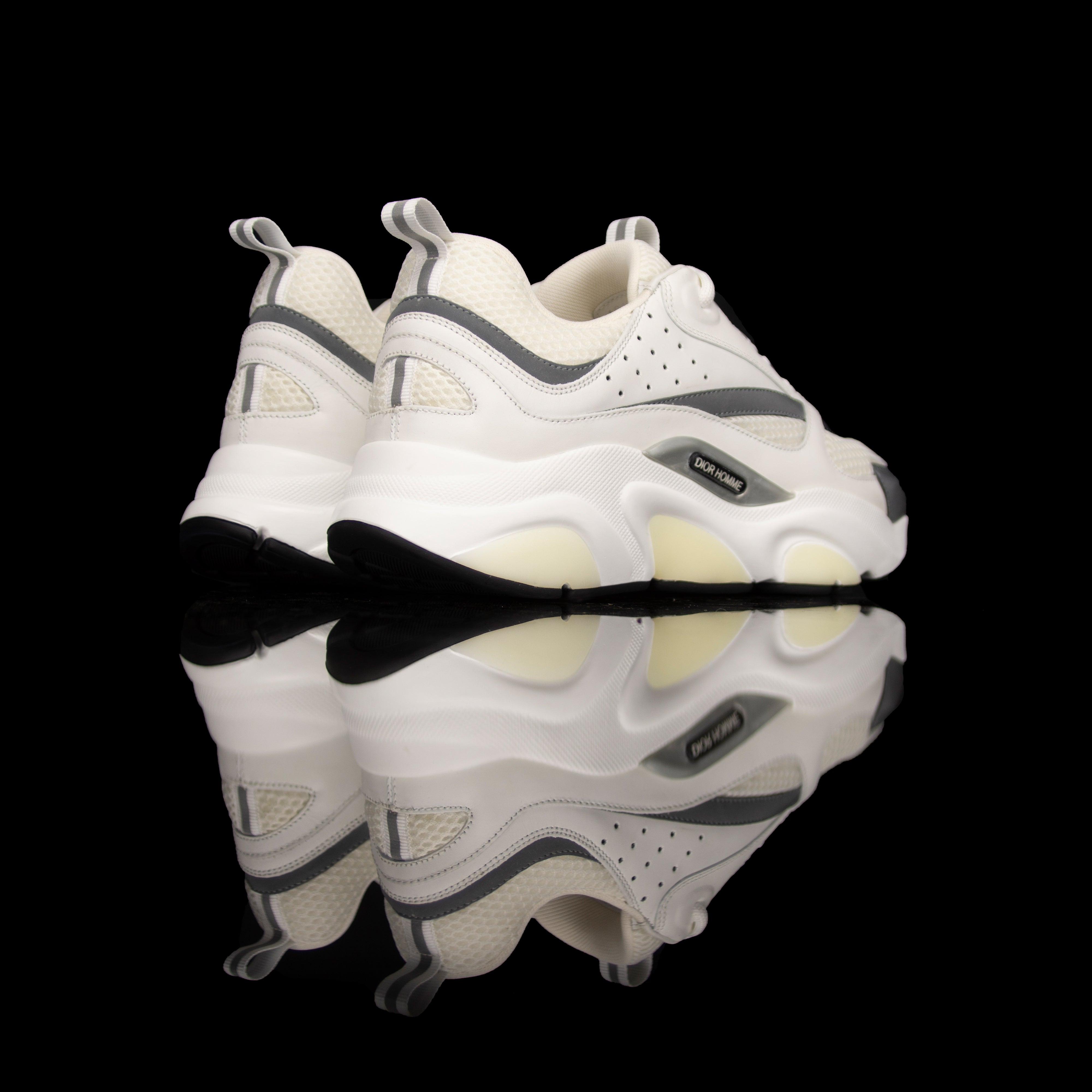 Dior Homme-B22 Sneakers-White technical knit and white calfskin Reflective Material on toe White cotton laces White nylon lining Black nylon pull tab Black rubber sole, textured “Dior Homme” logo “Welded” construction-fabriqe.com