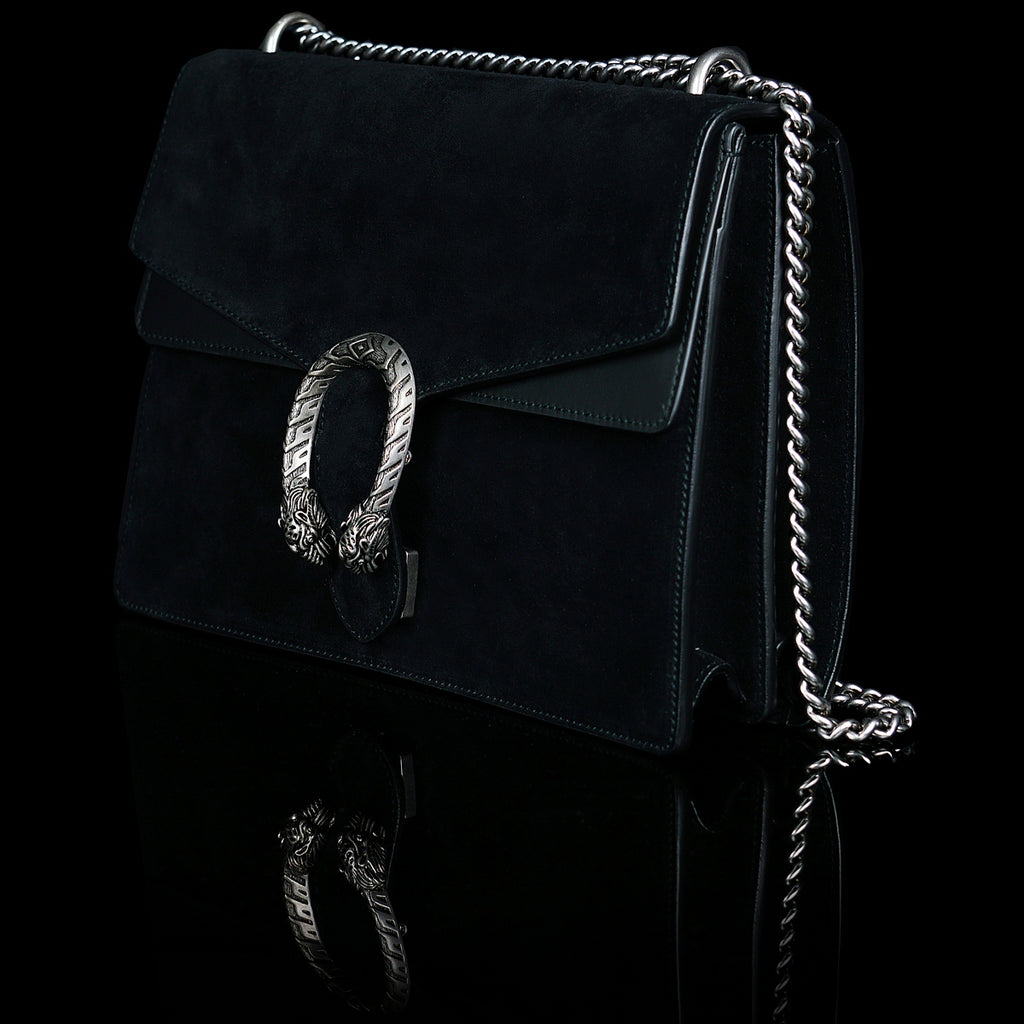 Gucci-Dionysus Shoulder Bag-Black Suede , a material with low environmental impact. Antique silver-toned hardware Tiger head closure Interior zippered compartment Pocket under the flap External rear pocket Sliding chain strap can be worn as a shoulder strap with 35 drop or can be worn as a top handle with 22 drop Medium size: W30cm x H21cm x D10cm Leather lining with interior pockets Made in Italy The model is 178 cm-fabriqe.com