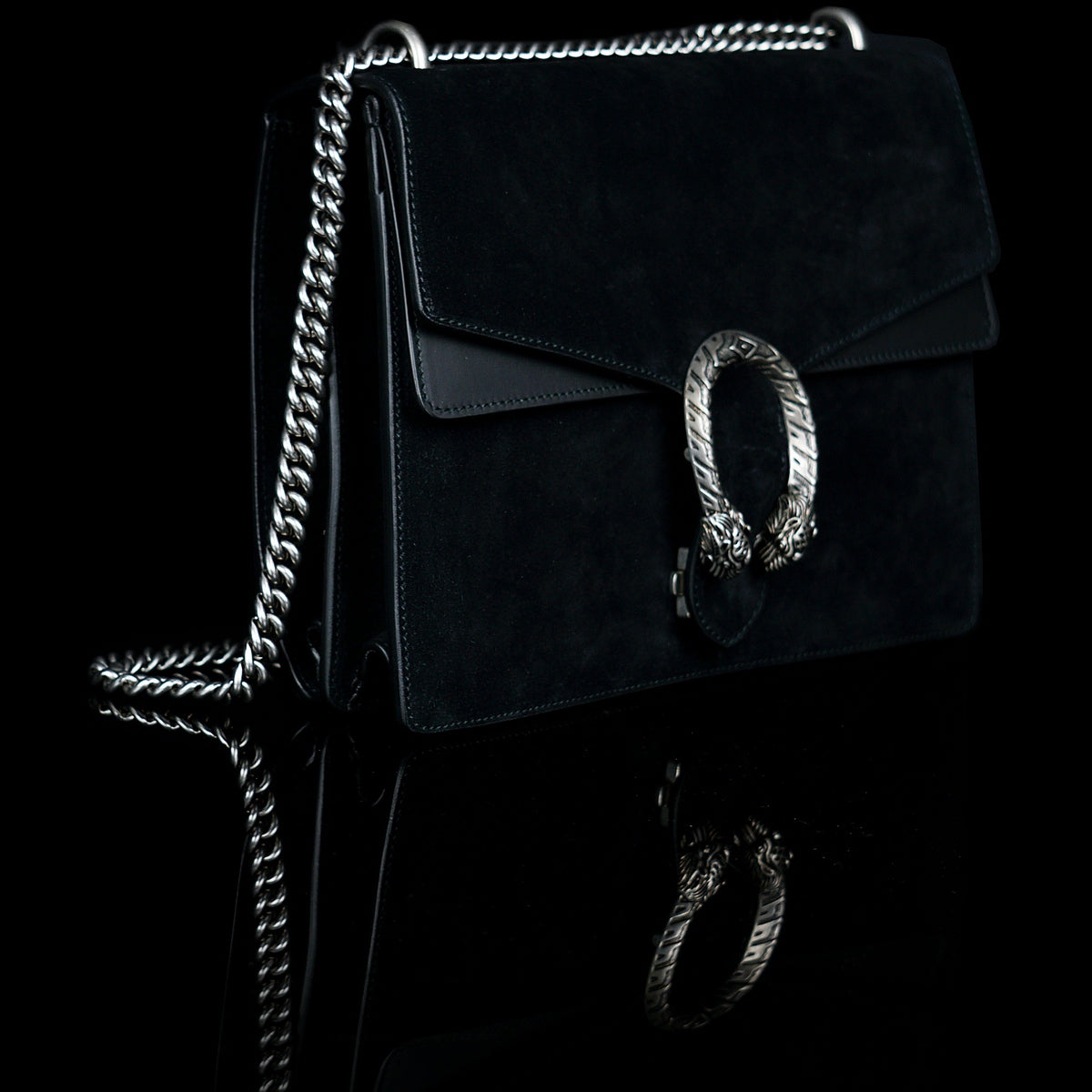 Gucci-Dionysus Shoulder Bag-Black Suede , a material with low environmental impact. Antique silver-toned hardware Tiger head closure Interior zippered compartment Pocket under the flap External rear pocket Sliding chain strap can be worn as a shoulder strap with 35 drop or can be worn as a top handle with 22 drop Medium size: W30cm x H21cm x D10cm Leather lining with interior pockets Made in Italy The model is 178 cm-fabriqe.com