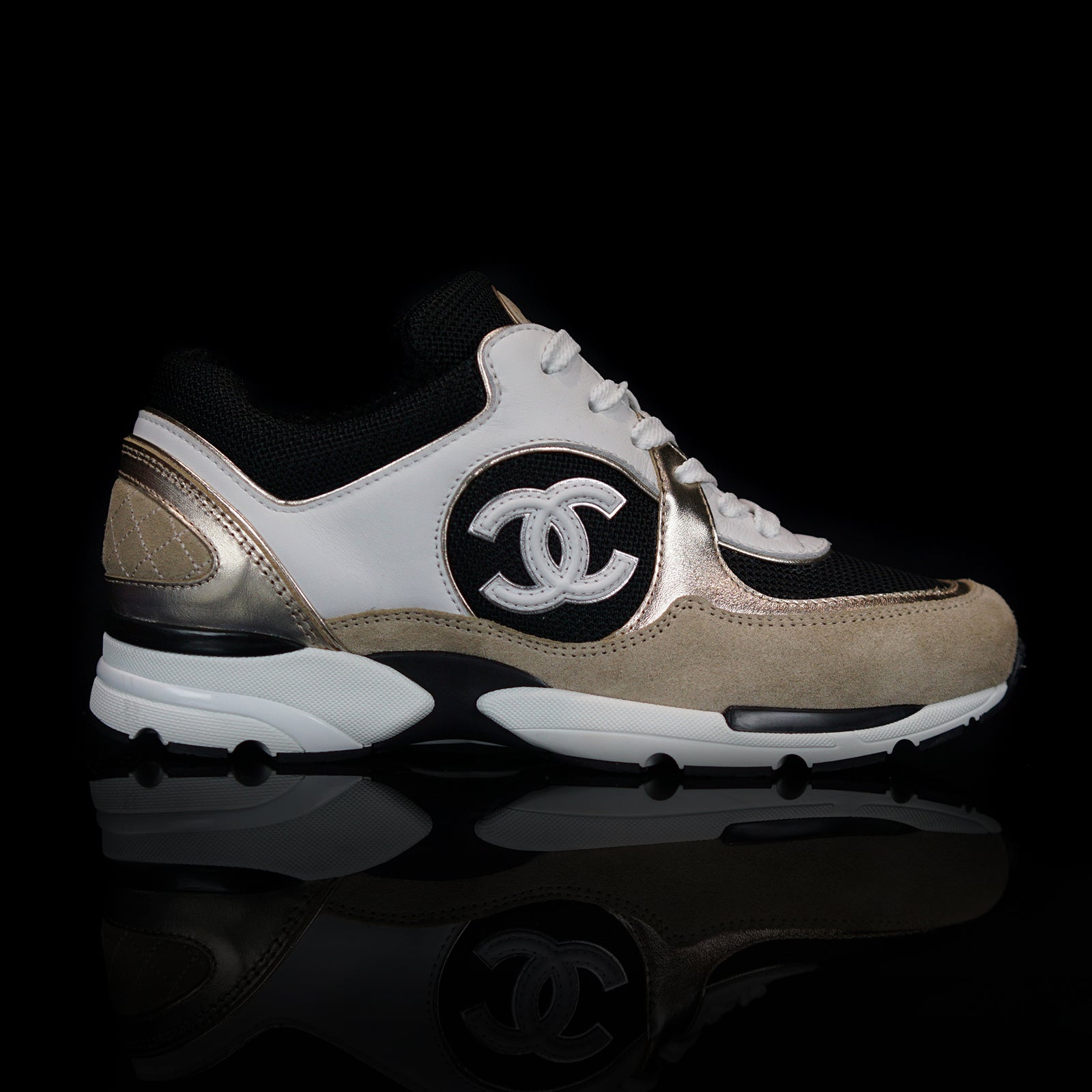 CHANEL 23C White Black Interlocking CC Sneakers 40.5 – Fashion Reloved