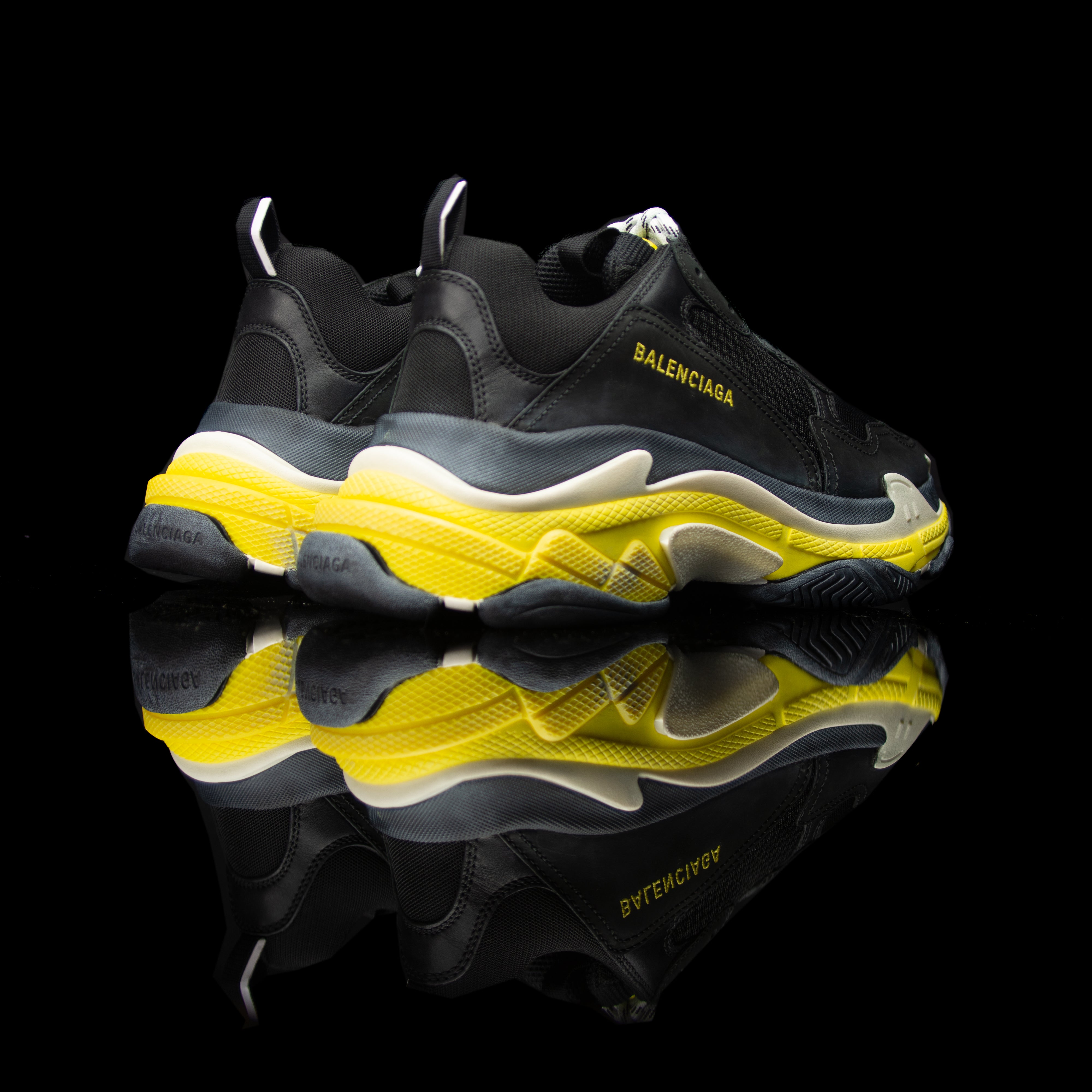 Balenciaga-Triple S-Pre Order Duration (3-5 Working Days) Product Code:534162 w09OG 1087 Colour: Black Yellow Limited Stock Material: Nubuck, Mesh, Rubber Sole Balenciaga Triple S Sneakers colour range is the new 2018 release for sneaker freaks. Crafted i