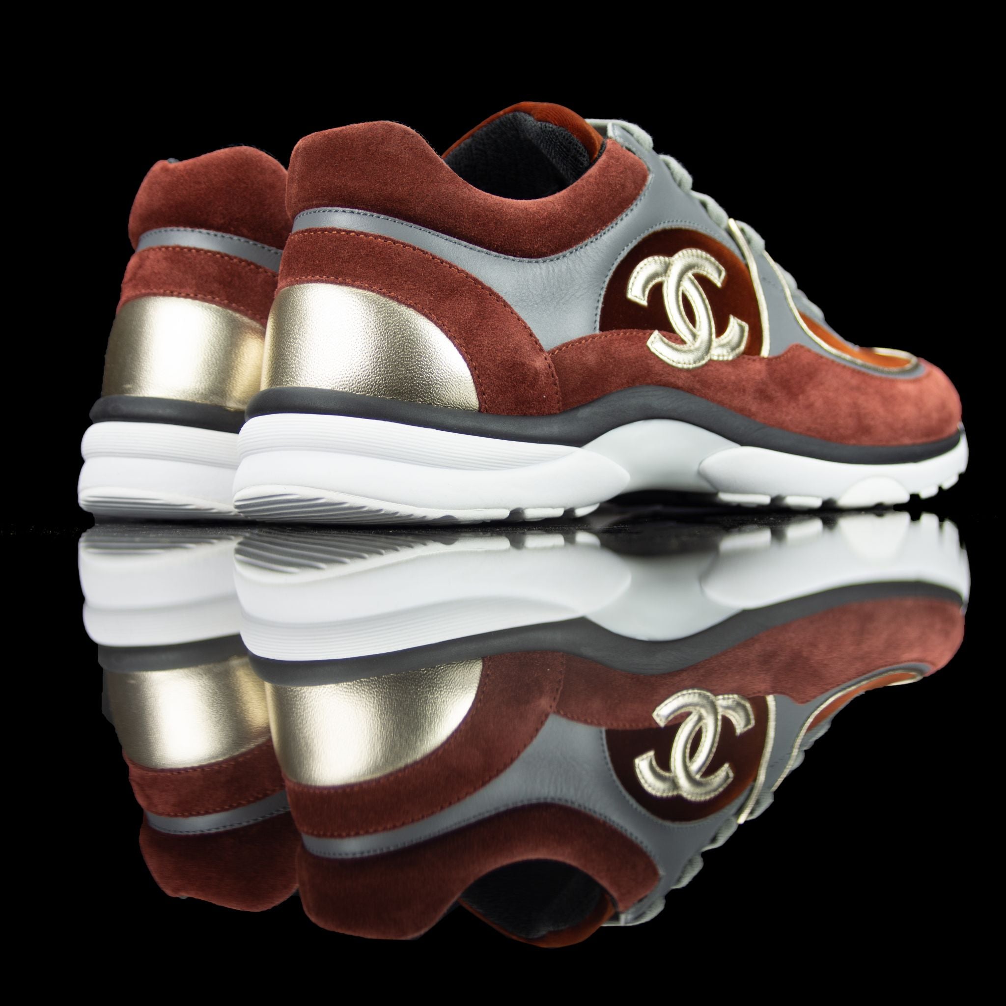 Chanel-CC Sneakers-Pre Order Duration (3-5 Working Days) CC Logo on side Maroon, Grey, Bronze Rubber Sole 2018 Release Limited Stock Chanel CCs crafted in mixed fabric sports CC branding on the side. Embellished in Maroon and Grey with a bronze touch. Nyl