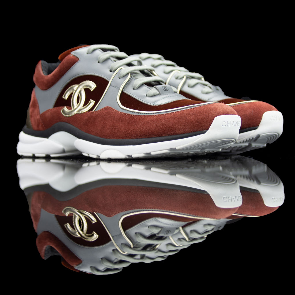 Chanel-CC Sneakers-Pre Order Duration (3-5 Working Days) CC Logo on side Maroon, Grey, Bronze Rubber Sole 2018 Release Limited Stock Chanel CCs crafted in mixed fabric sports CC branding on the side. Embellished in Maroon and Grey with a bronze touch. Nyl
