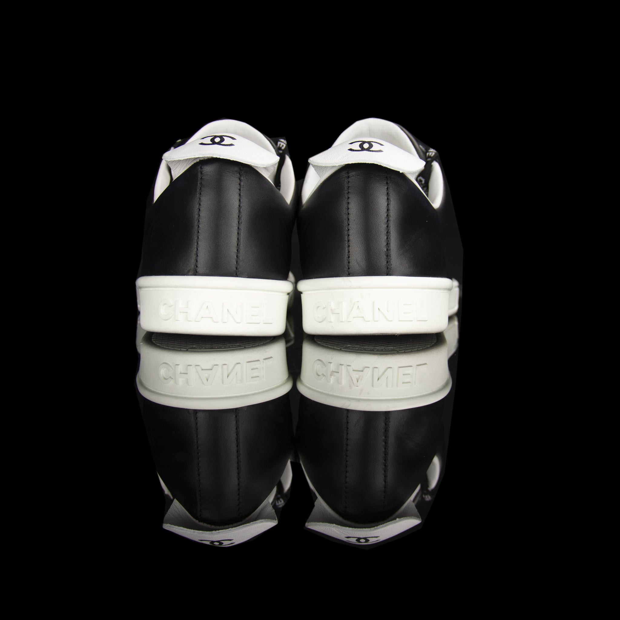 Chanel-Weekend sneakers-Colour: Black, White Mid Sole, White outer sole Limited Edition Calfskin Leather Chanel text on laces White Pull tab Black CC Logo on pull tab-fabriqe.com