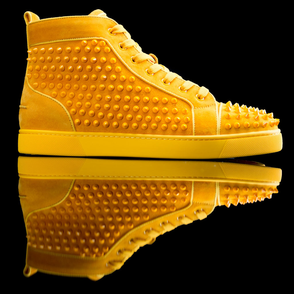 Christian Louboutin-Louis Flat High Spikes-Product Code: 3160092 Colour: Full Moon/Yellow Discontinued Material: Suede/Velour Rubber Sole Christian Louboutin Louis Flat Spikes Suede Yellow is on offer this season. Crafted in extroverted yellow and with si