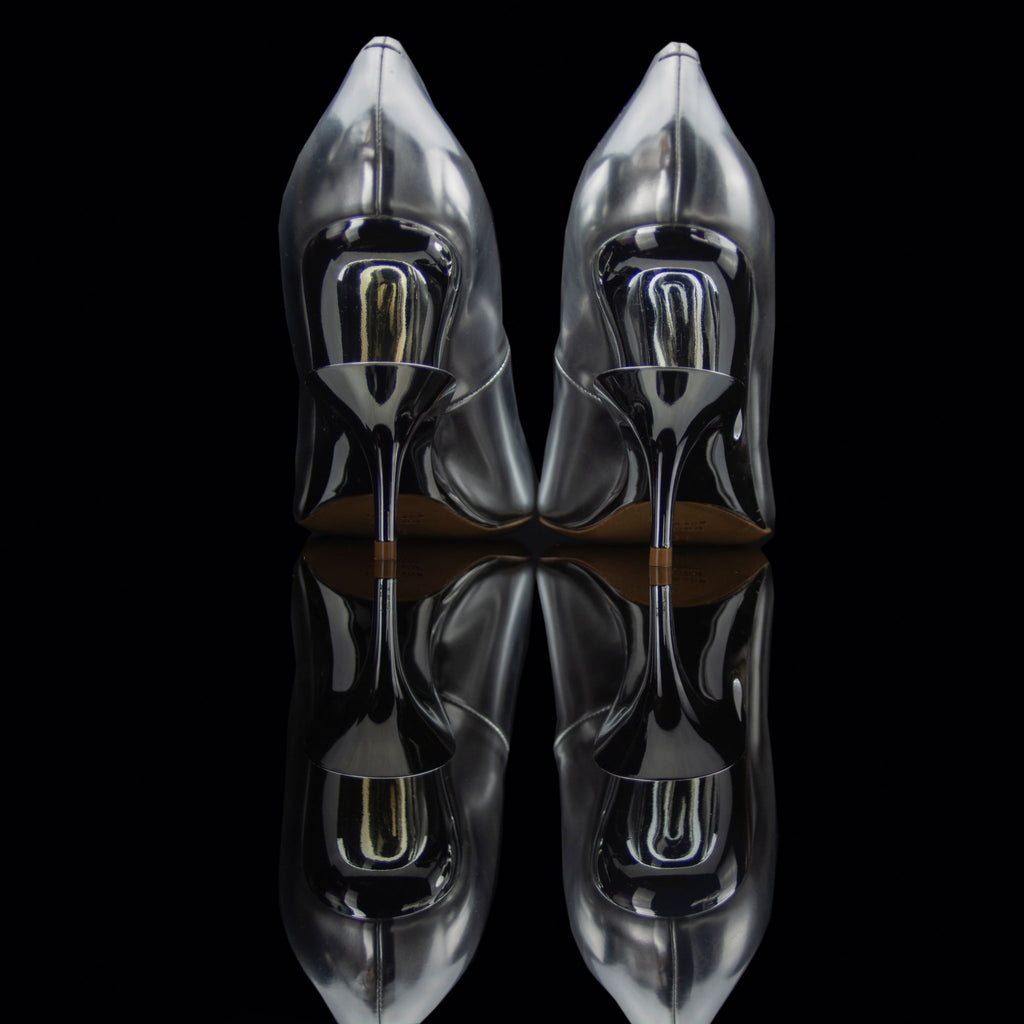 Maison Margiela-Heels-Silver/Chrome Pointed toe Stiletto heel 2108 Release Material: 70% Polyester/30% Cotton Second fabric: 100% Polyurethane Maison Margiela known for its exclusive cut out heels collection brings you fresh release this season. Embellish