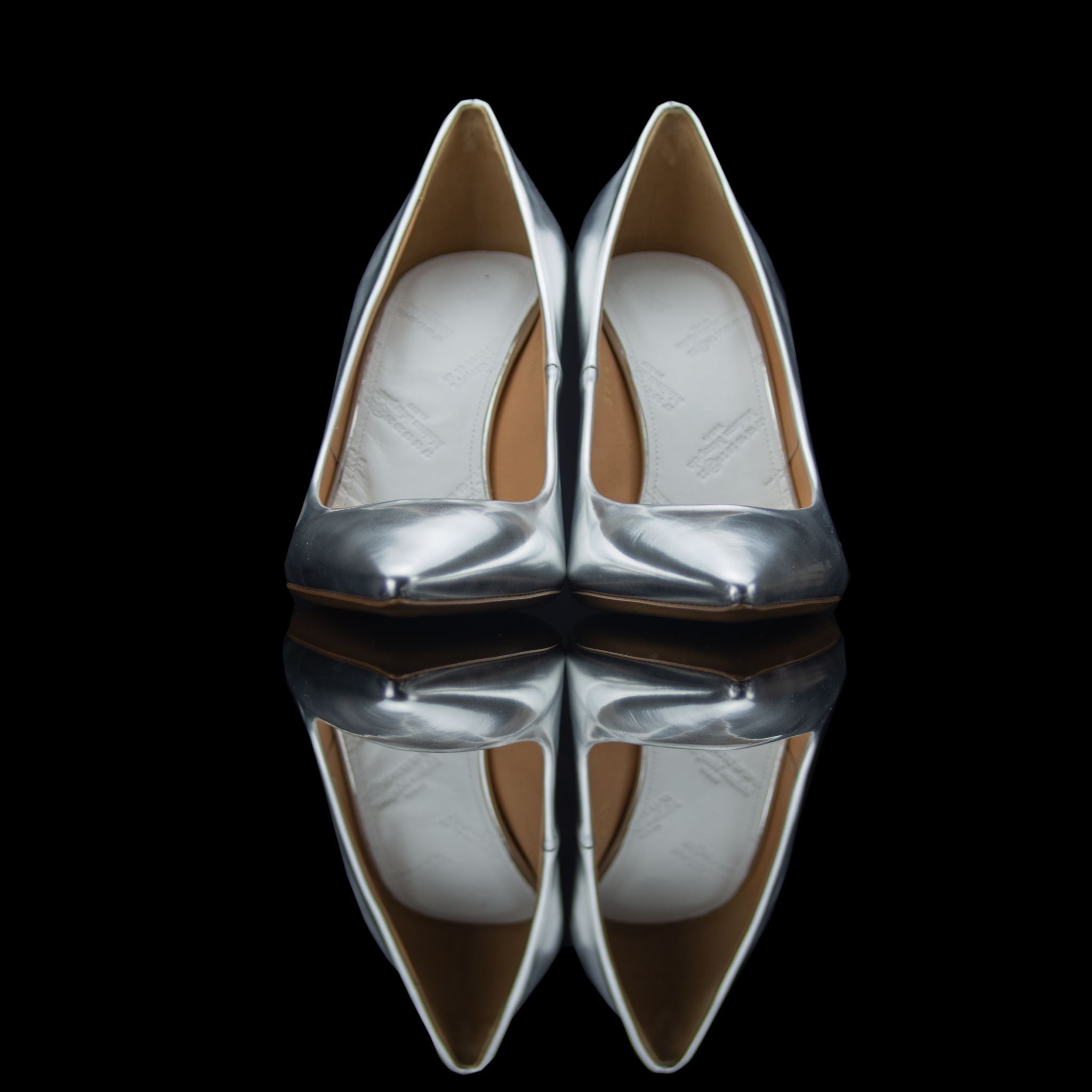 Maison Margiela-Heels-Silver/Chrome Pointed toe Stiletto heel 2108 Release Material: 70% Polyester/30% Cotton Second fabric: 100% Polyurethane Maison Margiela known for its exclusive cut out heels collection brings you fresh release this season. Embellish