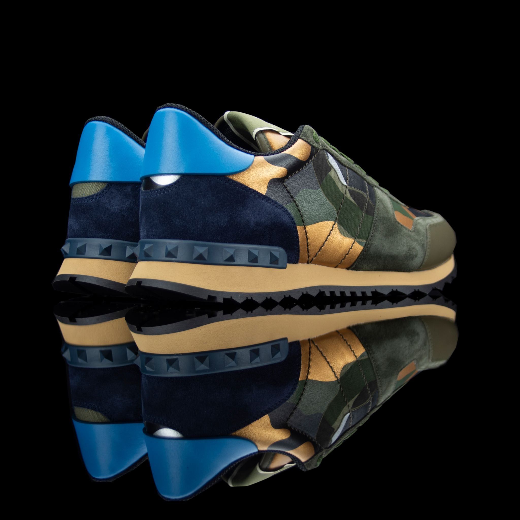 Valentino-Rockstud Sneakers-Product Code: PY2S0723IVN Colour: Multicolour Material: Leather, Suede Valentino Rockstud sneakers crafted in leather and suede feature camo design. Comfortably placed on rubber sole with a tough grip. The sneakers also sport a