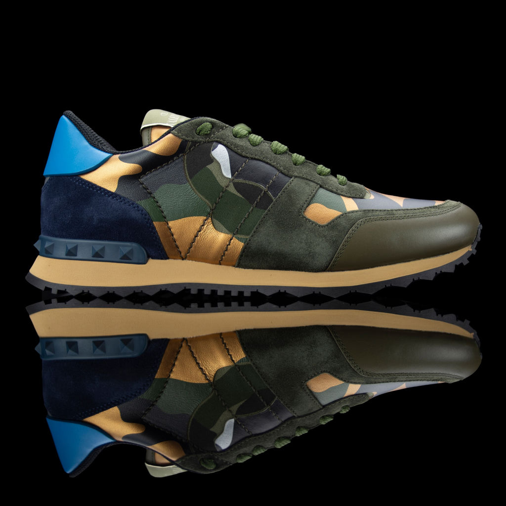 Valentino-Rockstud Sneakers-Product Code: PY2S0723IVN Colour: Multicolour Material: Leather, Suede Valentino Rockstud sneakers crafted in leather and suede feature camo design. Comfortably placed on rubber sole with a tough grip. The sneakers also sport a