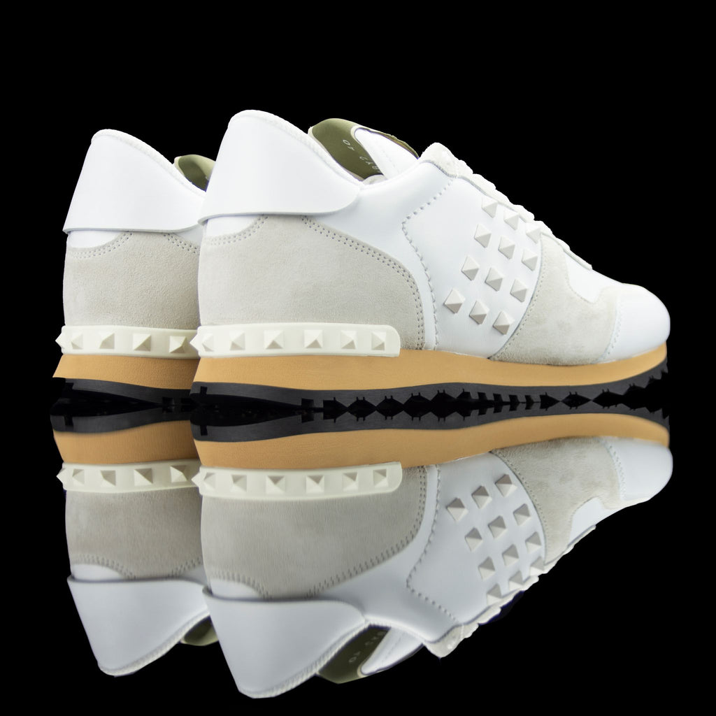Valentino-Rockstud Sneakers-Product Code: PY2S0748 Colour: Cream/White Material: Leather, Suede, Rubber Sole Valentino Rockstud collection brings you studded sneakers in cream and white. Crafted in leather and suede fabric and based on rubber sole. In add