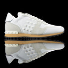 Valentino-Rockstud Sneakers-Product Code: PY2S0748 Colour: Cream/White Material: Leather, Suede, Rubber Sole Valentino Rockstud collection brings you studded sneakers in cream and white. Crafted in leather and suede fabric and based on rubber sole. In add