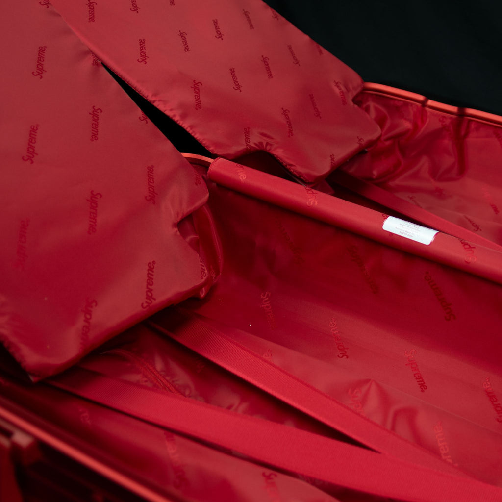 Rimowa-Suitcase-Colour: Red Exclusive-Limited Stock Aluminium/Aluminum, Plastic Handle Supreme X Rimowa Topas brings you the multiwheel suitcase. Designed exclusively for Supreme in aluminium bodies by Rimowa. This suitcase feature TSA combination locks a