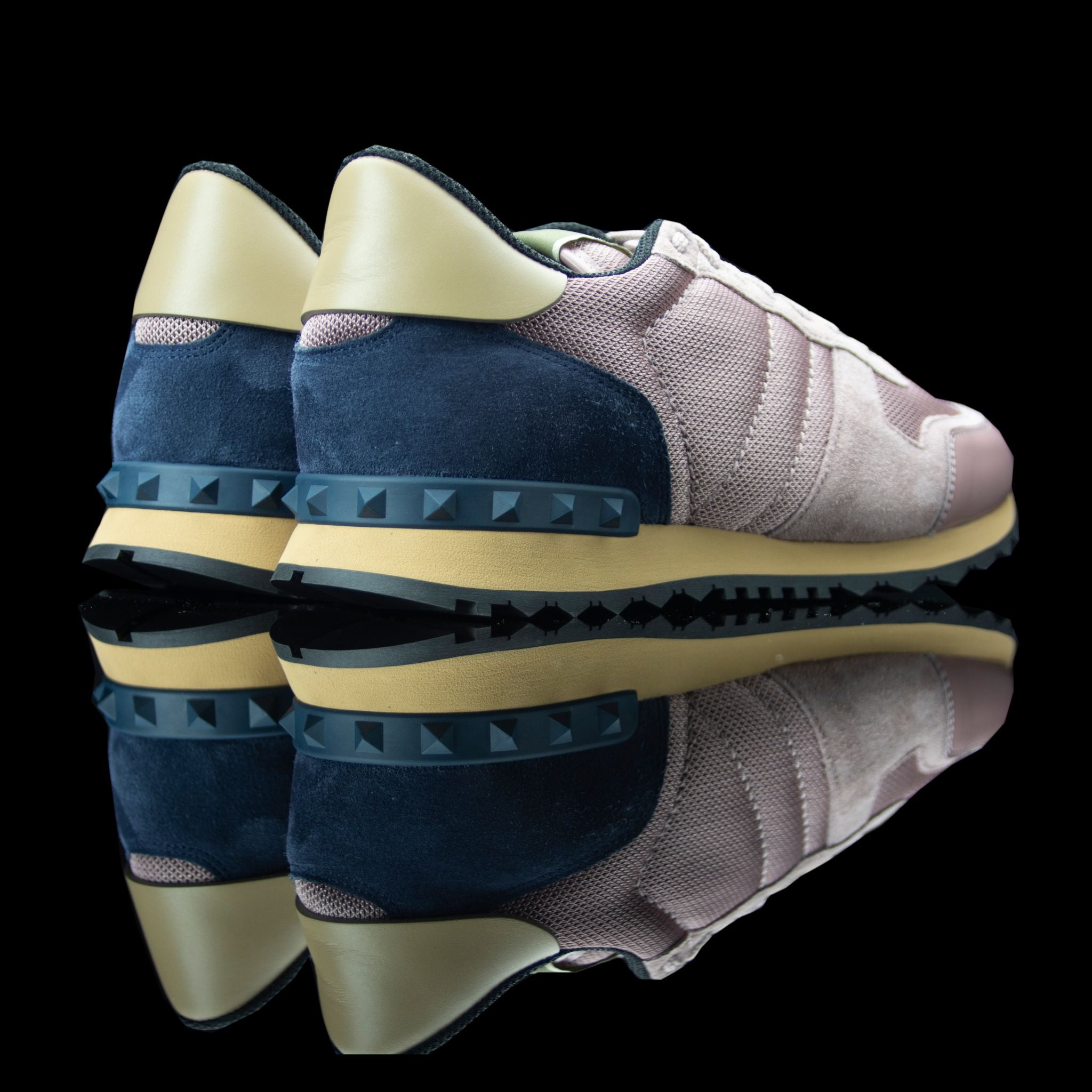 Valentino-Rockstud Sneakers-Product Code: Colour: Pink / Navy Material: Leather, Suede, Canvas, Rubber Sole Valentino Rockstud collection brings you canvas sneakers in pink and navy. Crafted in leather, suede and canvas fabric and is based on rubber sole.