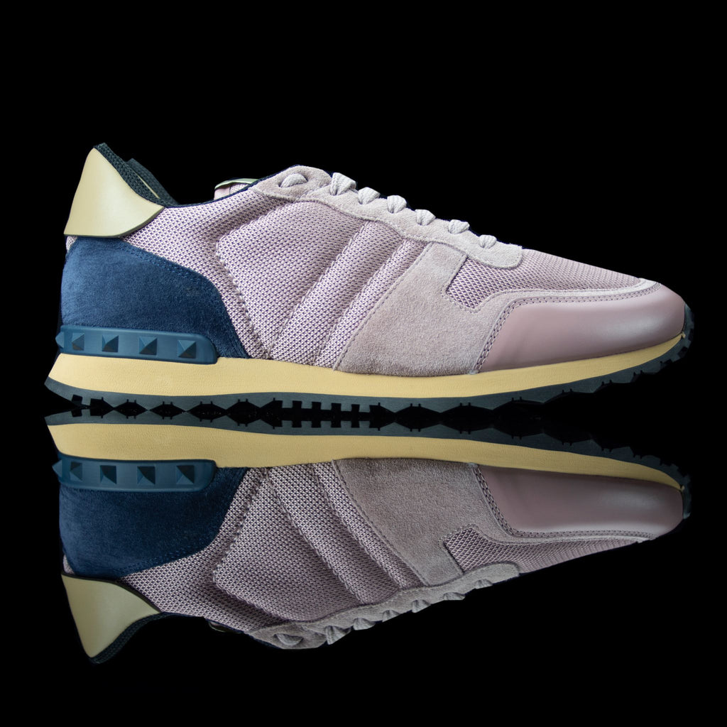 Valentino-Rockstud Sneakers-Product Code: Colour: Pink / Navy Material: Leather, Suede, Canvas, Rubber Sole Valentino Rockstud collection brings you canvas sneakers in pink and navy. Crafted in leather, suede and canvas fabric and is based on rubber sole.